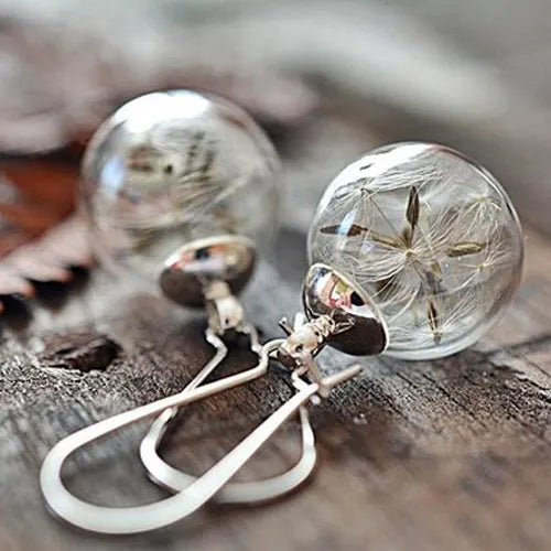 2 pares aretes con forma de globo y semilla de diente de león