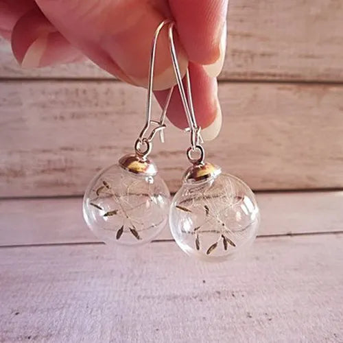 2 pares aretes con forma de globo y semilla de diente de león