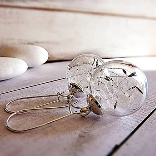 2 pares aretes con forma de globo y semilla de diente de león