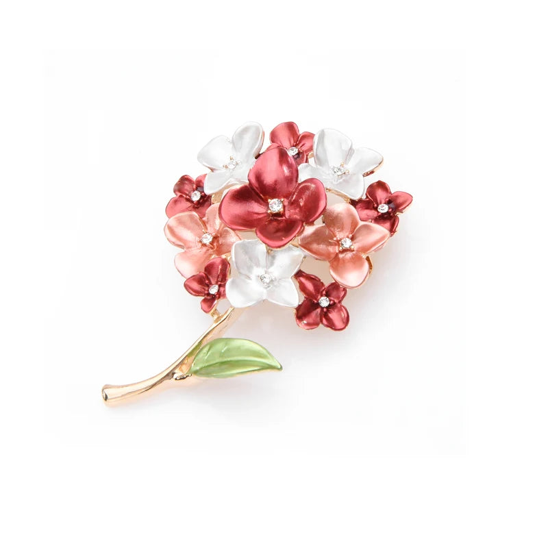 Fliederfarbene Blumennadeln und Broschen